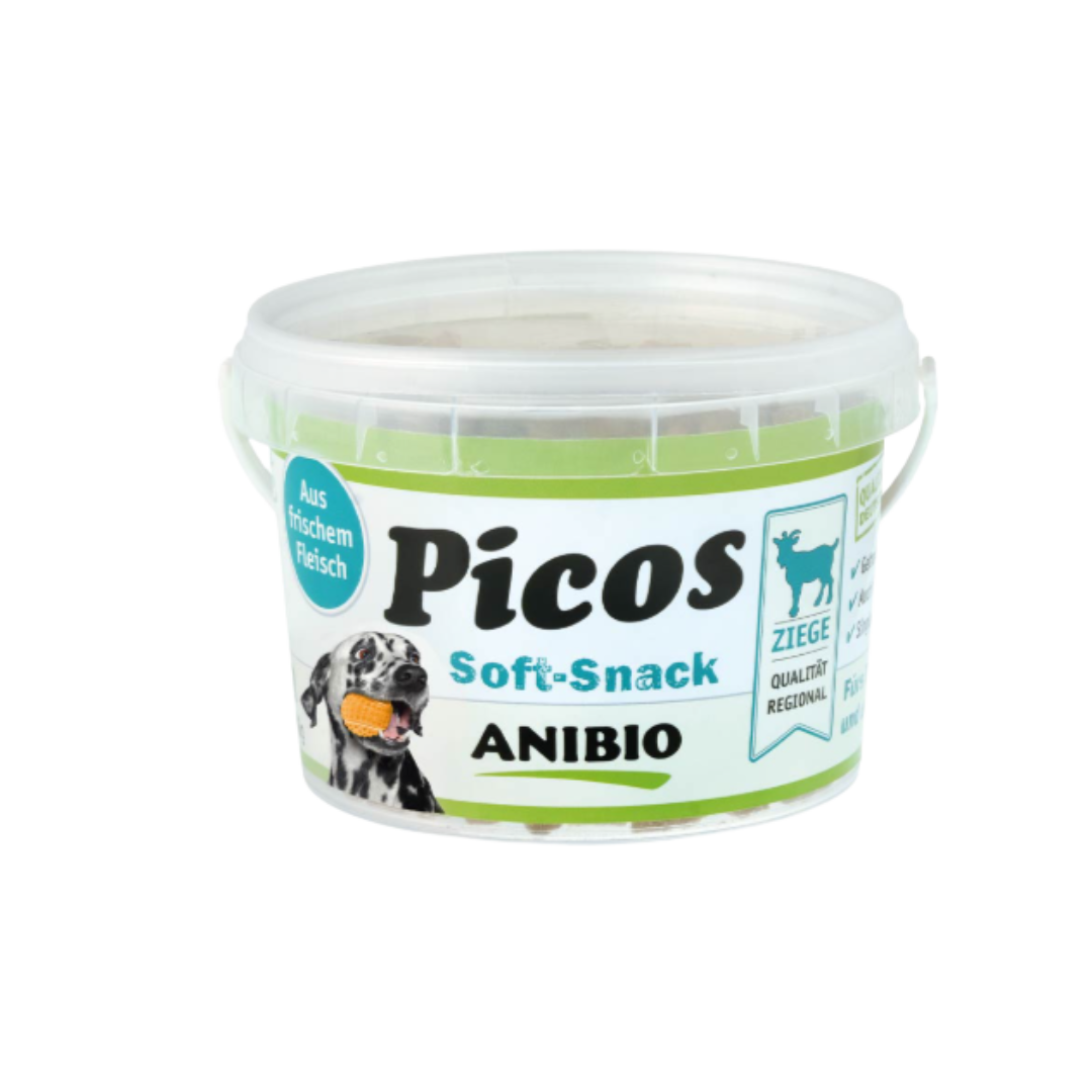 Dose mit Deckel, beschriftet mit 'Picos Soft-Snack', Marke 'ANIBIO', enthält Ziegenfleisch, abgebildet mit einem Hund und einem Ziegensymbol.