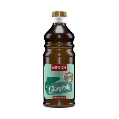 Braune Flasche mit goldfarbenem Deckel, beschriftet mit 'NAPFSTOFF Glanzstoff' und einem grünen Symbol eines Tieres. Inhalt 250 ml.