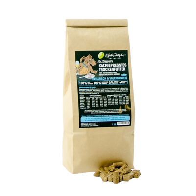Braune Verpackung mit Dr. Ziegler's kaltgepresstem Trockenfutter für Hunde, Sorte Weißfisch & Vollkornreis, 1 kg, mit Nährwerttabelle und Produktinformationen.