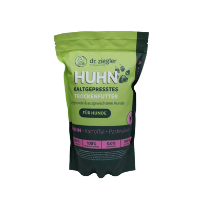 Grün-schwarze Verpackung mit Aufschrift 'dr. ziegler Naturfutter HUHN KALTGEPRESSTES TROCKENFUTTER für Hunde' und Zutaten 'Huhn, Kartoffel, Pastinake'.
