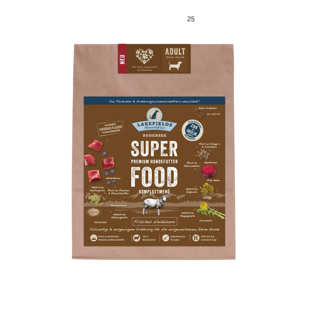 Verpackung von Lakefields Superfood für Hunde, 1 kg. Braune Tüte mit Bildern von Weidelamm, Kräutern und dem Text 'NEU' und 'MINI Adult'.
