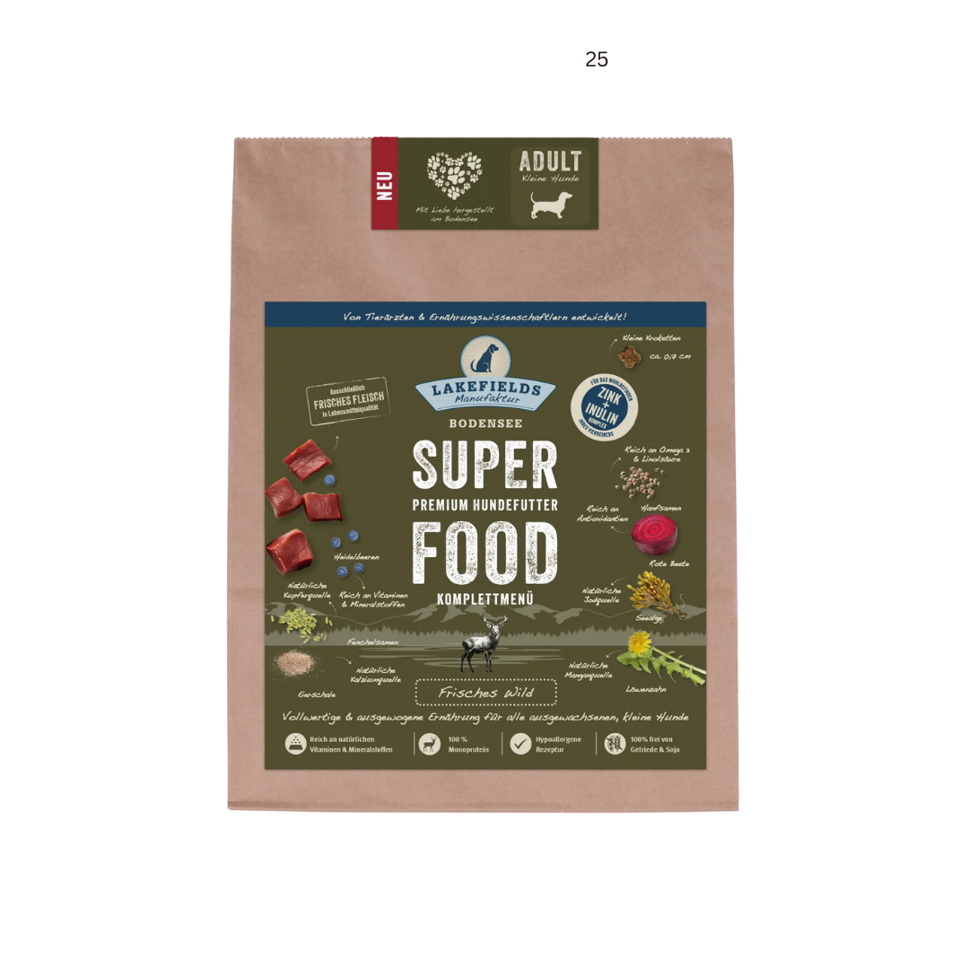 Verpackung von Lakefields Superfood für Hunde, 1 kg. Grüne Tüte mit Bildern von Wild, Kräutern und dem Text 'NEU' und 'MINI Adult'.