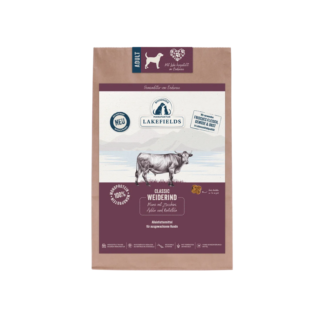 Beige-braune Verpackung mit Abbildung einer Kuh, Text 'Lakefields Classic Weiderind', Hundesymbol und Hinweis auf Trockenfutter für erwachsene Hunde.