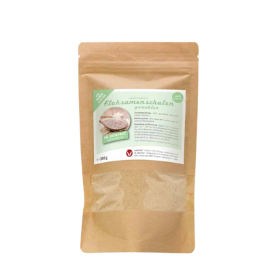 Verpackung von Flohsamenschalen, 300g, in brauner Papiertüte mit transparentem Fenster. Auf dem Etikett steht 'Flohsamenschalen gemahlen'.