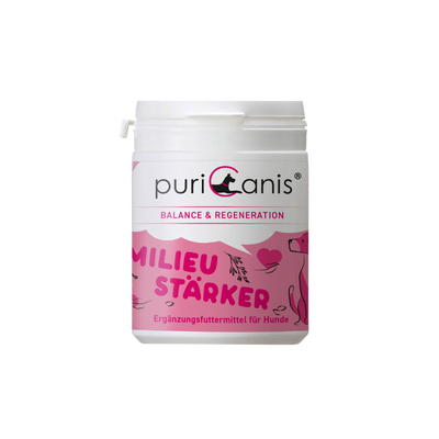 Weißer Kunststoffbehälter mit rosa Etikett, darauf Schriftzug 'puriCanis BALANCE & REGENERATION MILIEU STÄRKER Ergänzungsfuttermittel für Hunde' und Zeichnung eines sitzenden Hundes sowie verschiedener Pflanzen und Gemüse