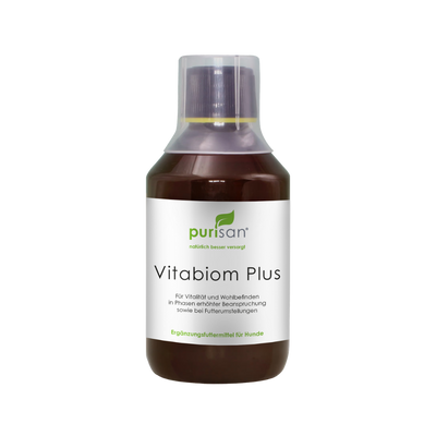 Braune Flasche mit weißem Etikett und Aufschrift 'purisan Vitabiom Plus' als Ergänzungsfuttermittel für Hunde