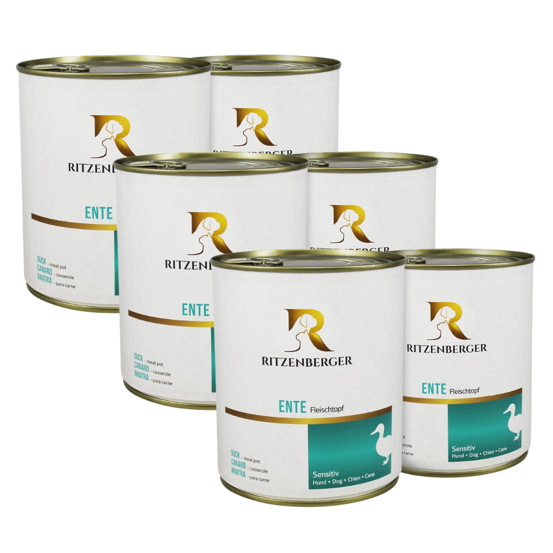 Sechs weiße Dosen mit goldfarbenem Deckel, Marke Ritzenberger, Aufschrift 'ENTE Fleischtopf' und stilisierte weiße Entensilhouette auf türkisfarbenem Feld.