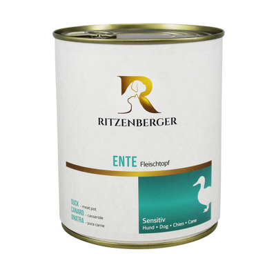 Weiße Dose mit goldfarbenem Deckel, Aufschrift 'Ritzenberger', 'ENTE Fleischtopf', darunter Silhouette einer Ente und Hinweise auf empfindliche Hunde.