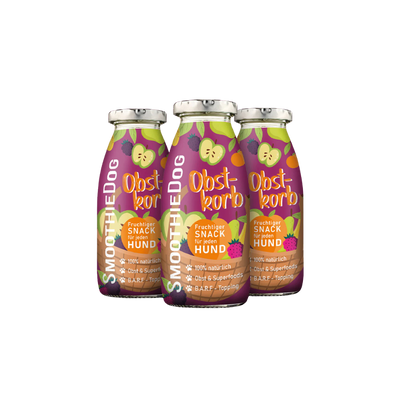 Drei Flaschen SmoothieDog Obstkorb mit buntem Fruchtetikett und silbernem Verschluss