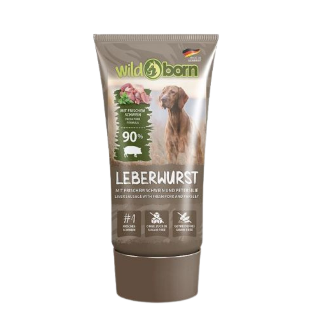 Braune Tube Wildborn Schwein Leberwurst mit Bild eines Hundes, Text zu 90% frischem Schwein, ohne Zucker und getreidefrei.