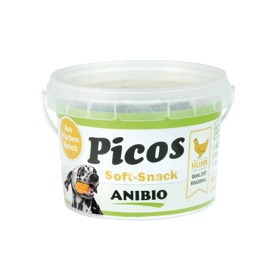 Dose mit Deckel, beschriftet mit 'Picos Soft-Snack', Marke 'ANIBIO', enthält Hühnerfleisch, abgebildet mit einem Hund und einem Huhnsymbol.