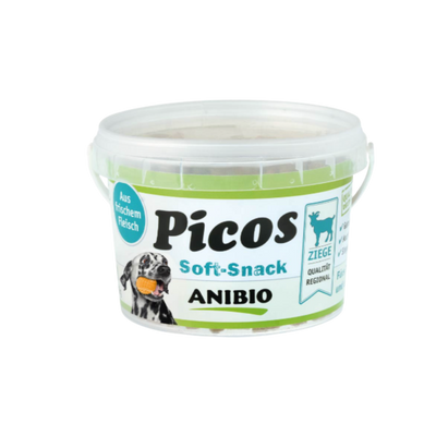 Dose mit Deckel, beschriftet mit 'Picos Soft-Snack', Marke 'ANIBIO', enthält Ziegenfleisch, abgebildet mit einem Hund und einem Ziegensymbol.
