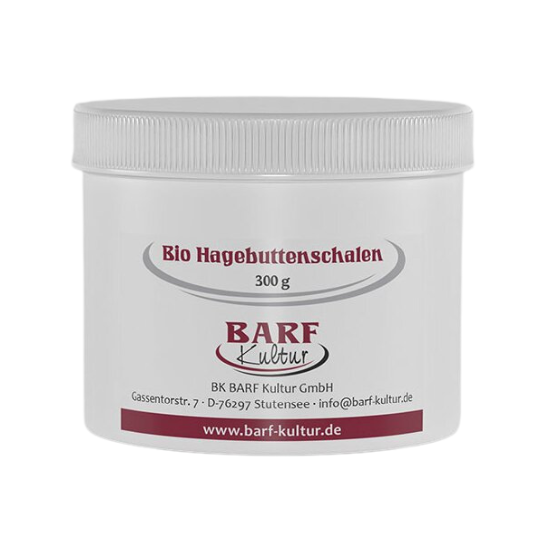 Runder, weißer Kunststoffbehälter mit Schraubdeckel, beschriftet mit 'Bio Hagebuttenschalen 300 g' und dem Logo 'BARF Kultur'.