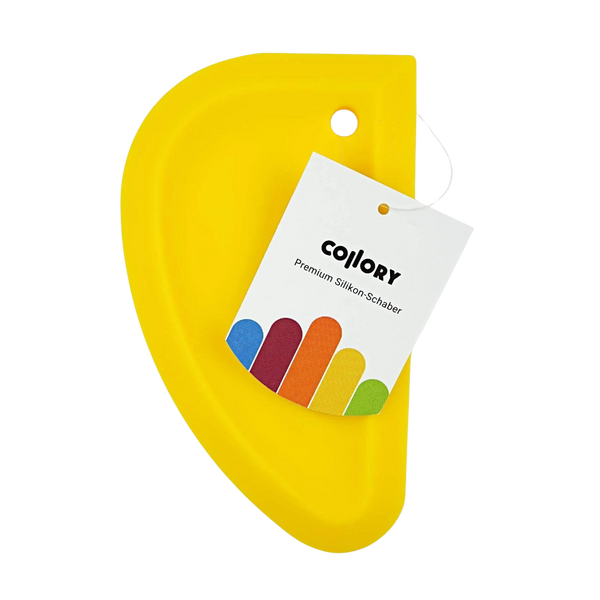 Gelber Silikonschaber in halbrunder Form mit Anhänger aus Papier mit dem Text 'COLLORY Premium Silikon-Schaber'.