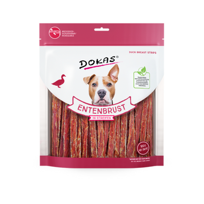 Verpackung von DOKAS Entenbrust in Streifen für Hunde. Die Tüte zeigt einen Hund mit braunem Fell und einem weißen Fleck auf der Brust. Auf der Vorderseite steht 'DOKAS' und 'ENTENBRUST'