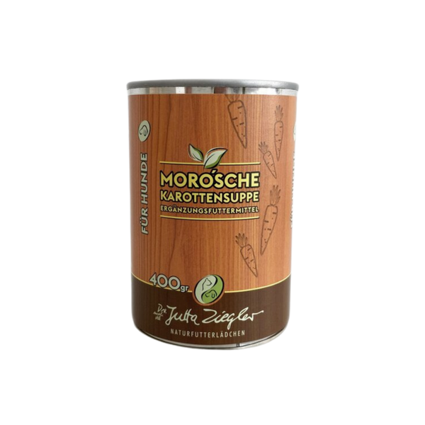 Dose mit Karottensuppe für Hunde. Auf der Vorderseite steht 'MORO'sche Karottensuppe', '400 gr' und 'Ergänzungsfuttermittel'. Dekorative Karottenmuster sind abgebildet.