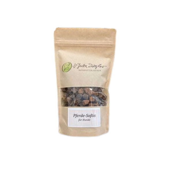 Braune Papiertüte mit transparentem Fenster, beschriftet mit 'Pferde-Softis für Hunde' und dem Logo von 'Jutta Ziegler Naturfuttermittel'.