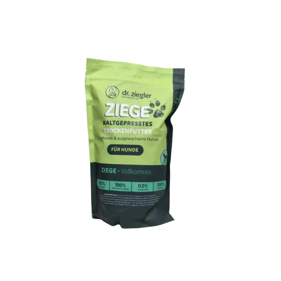 Grüne Tüte mit schwarzem Etikett für Dr. Ziegler's kaltgepresstes Trockenfutter für Junghunde und ausgewachsene Hunde, Ziege & Vollkornreis, 1 kg.