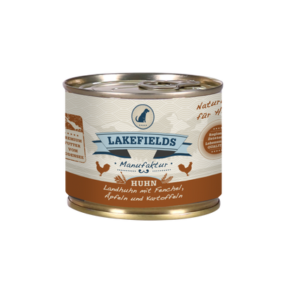 Runde Dose mit dem Etikett 'LAKEFIELDS', Inhalt: Landhuhn mit Fenchel, Äpfeln und Kartoffeln. Die Dose hat einen metallischen Glanz und eine braune Farbfläche.