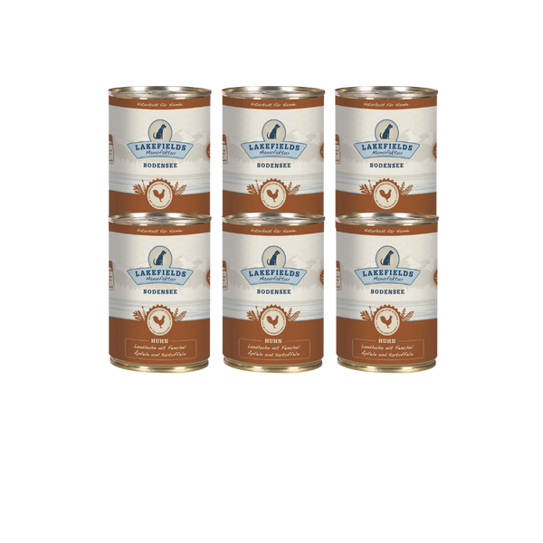 Sechs Runde Dosen mit dem Etikett 'LAKEFIELDS', Inhalt: Landhuhn mit Fenchel, Äpfeln und Kartoffeln. Die Dose hat einen metallischen Glanz und eine braune Farbfläche.
