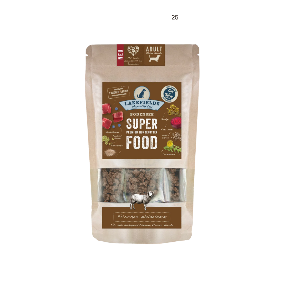 Verpackung von Lakefields Superfood für Hunde, 130g. Braune Tüte mit Bildern von Weidelamm, Kräutern und dem Text 'NEU' und 'MINI Adult'.
