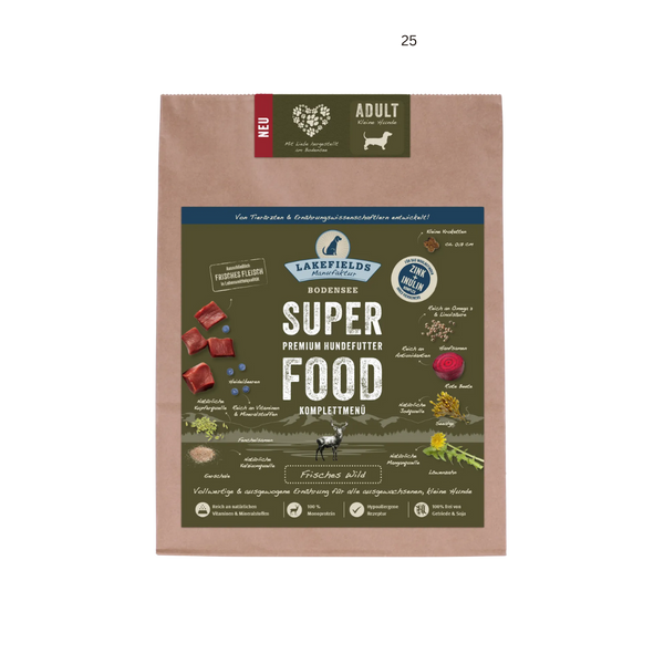 Verpackung von Lakefields Superfood für Hunde, 1 kg. Grüne Tüte mit Bildern von Wild, Kräutern und dem Text 'NEU' und 'MINI Adult'.
