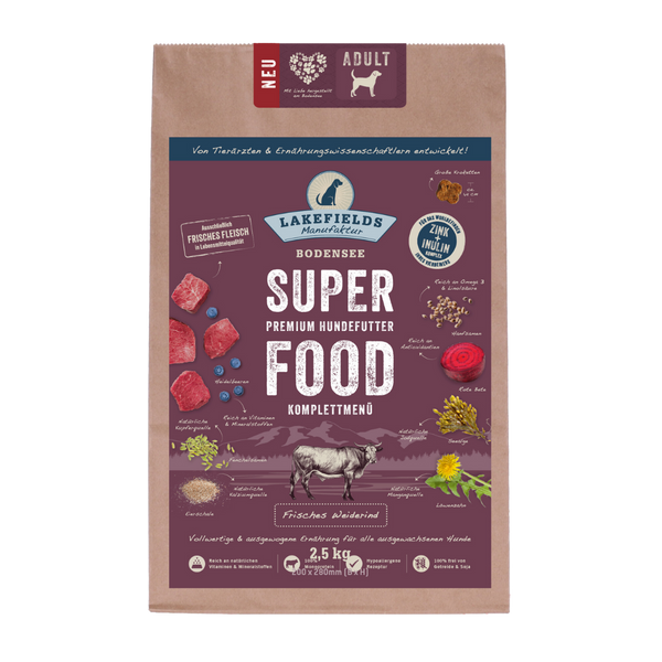 Verpackung von Lakefields Superfood für Hunde, 2.5 kg. Violette Tüte mit Bildern von Weiderind, Kräutern und dem Text 'NEU' und 'Adult'.