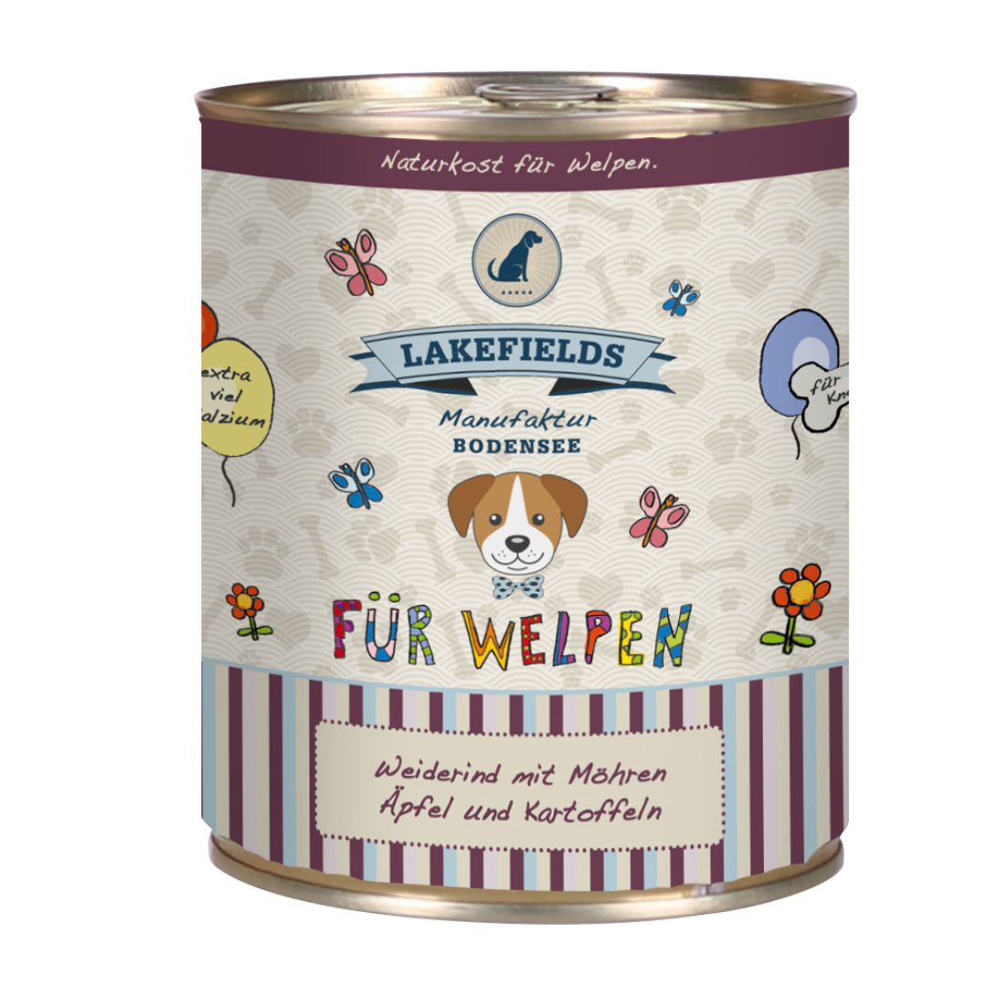 Runde Dose mit Hundefutter von Lakefields, 800g. Auf dem Etikett steht 'BODENSEE FÜR WELPEN', mit Abbildungen von Hunden, Blumen und Texten.