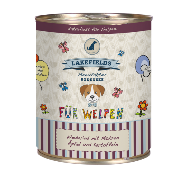 Runde Dose mit Hundefutter von Lakefields, 800g. Auf dem Etikett steht 'BODENSEE FÜR WELPEN', mit Abbildungen von Hunden, Blumen und Texten.