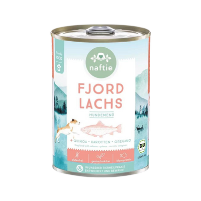 Runddose mit dem Produktnamen 'FJORD LACHS' von naftie. Enthält Quinoa, Karotten und Oregano. Abgebildet sind ein Hund und eine Landschaft mit Bergen und Wasser.