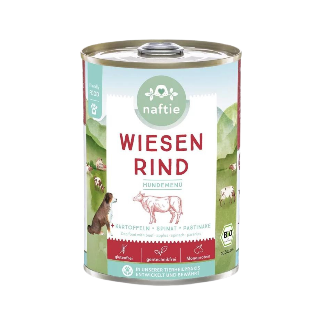 Dose mit Bio-Hundefutter von naftie, 400g, mit Abbildung eines Hundes und Landschaft im Hintergrund. Aufschrift: 'WIESEN RIND HUNDEMENÜ.