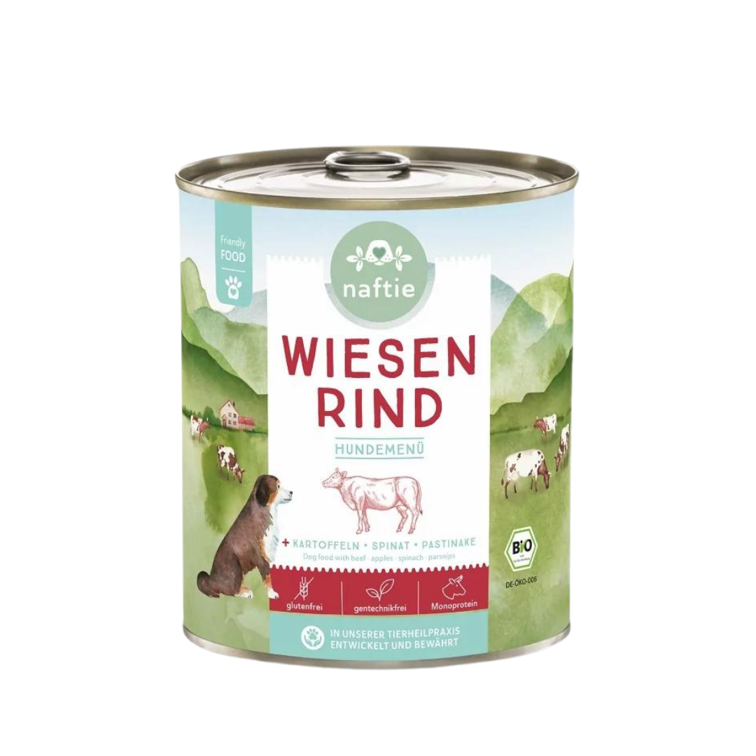 Dose mit Bio-Hundefutter von naftie, 800g, mit Abbildung eines Hundes und Landschaft im Hintergrund. Aufschrift: 'WIESEN RIND HUNDEMENÜ.