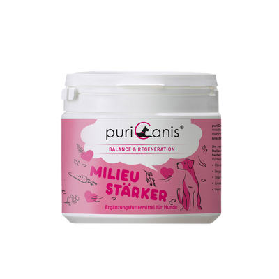Weißer Kunststoffbehälter mit rosa Etikett, darauf Schriftzug 'puriCanis BALANCE & REGENERATION MILIEU STÄRKER Ergänzungsfuttermittel für Hunde' und Zeichnung eines sitzenden Hundes sowie verschiedener Pflanzen und Gemüse