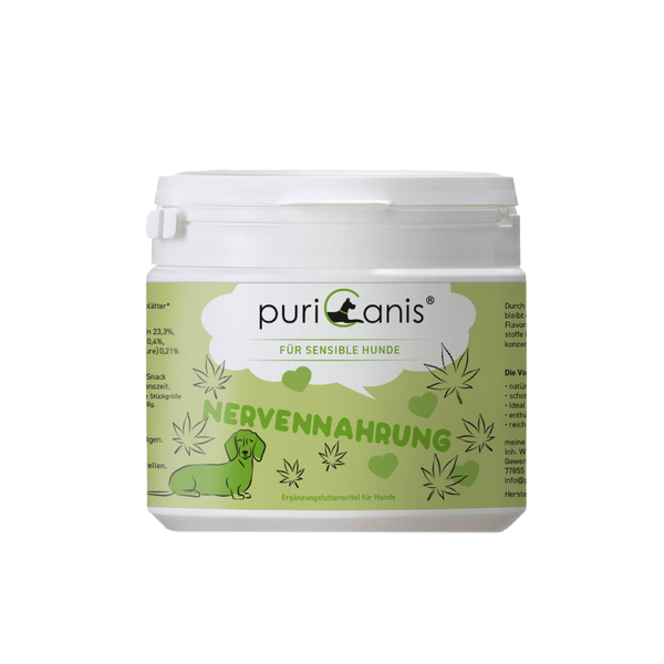 Weißer Kunststoffbehälter mit grünem Etikett und Aufschrift 'puriCanis FÜR SENSIBLE HUNDE NERVENNAHRUNG' sowie einer grünen Hundesilhouette und stilisierten Blättern
