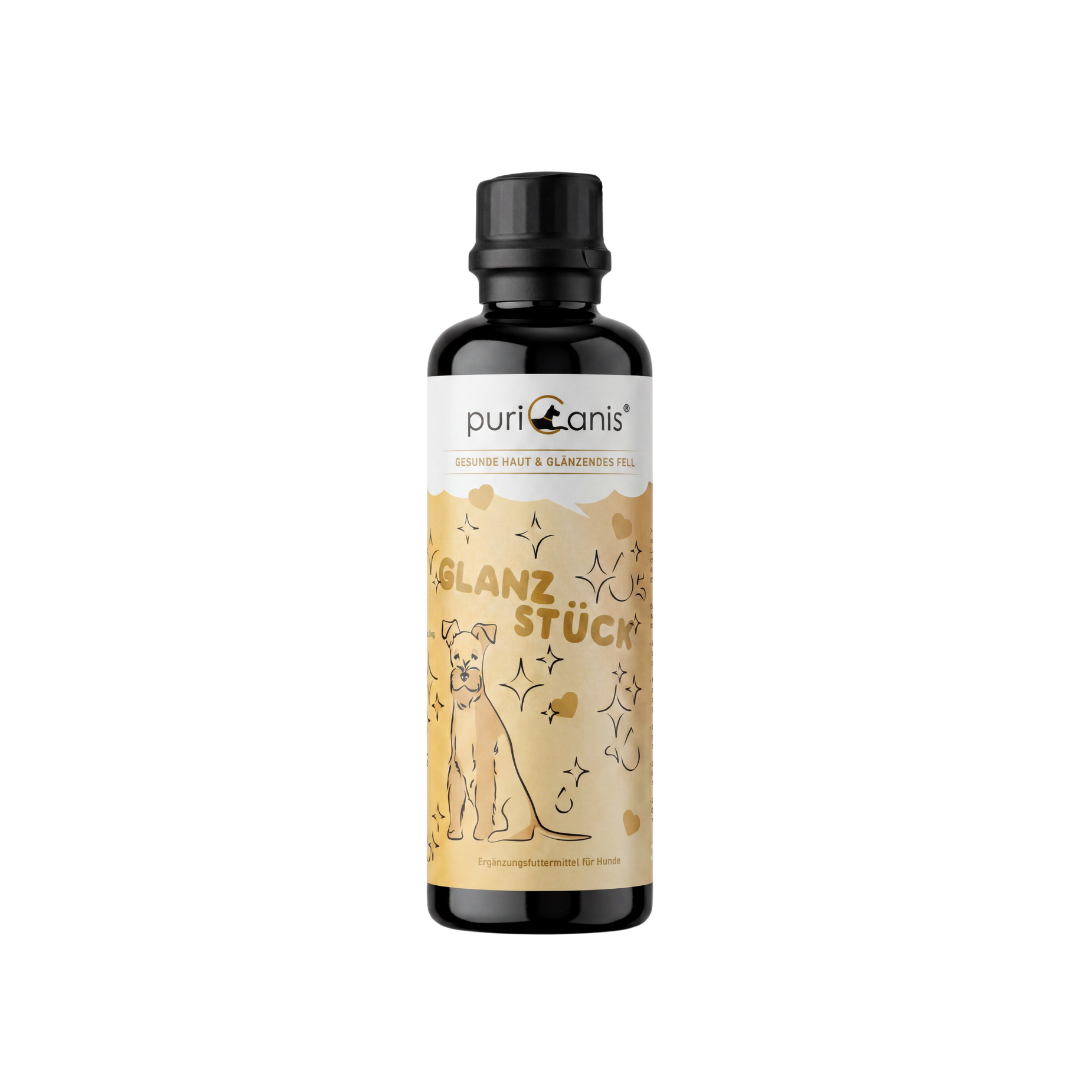 Flasche mit schwarzem Verschluss und beige-weißem Etikett mit Hundzeichnung und Schriftzug 'puricanis' und 'Glanzstück'