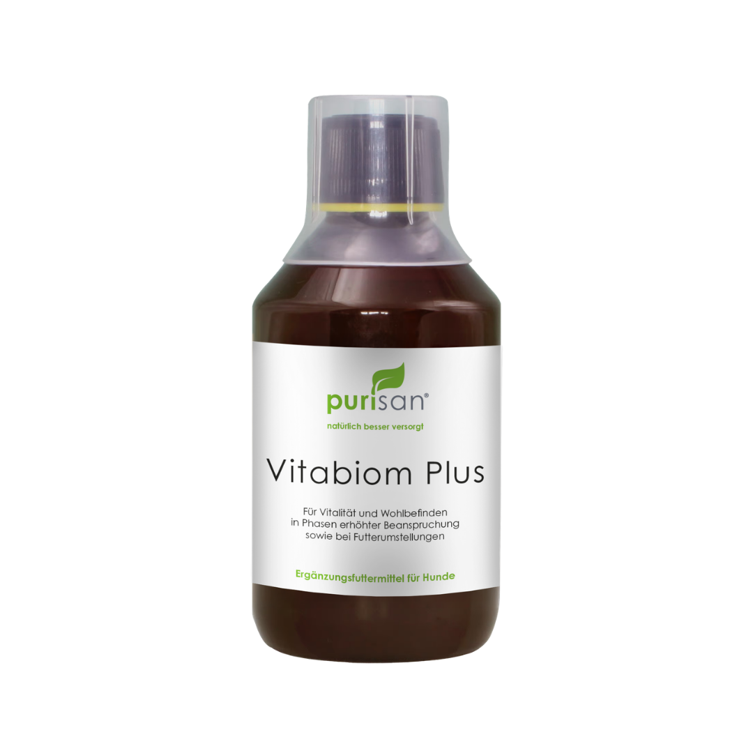 Braune Flasche mit weißem Etikett und Aufschrift 'purisan Vitabiom Plus' als Ergänzungsfuttermittel für Hunde