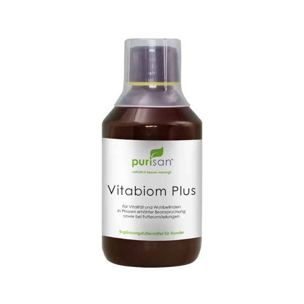 Braune Flasche mit weißem Etikett und Aufschrift 'purisan Vitabiom Plus' als Ergänzungsfuttermittel für Hunde