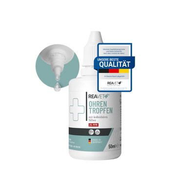 Weiße Flasche mit Tropfspitze und Etikett 'REAVET OHREN TROPFEN mit kolloidalem Silber 25 PPM', 50 ml, Made in Germany, daneben Nahaufnahme eines Tropfens am Flaschenhals.