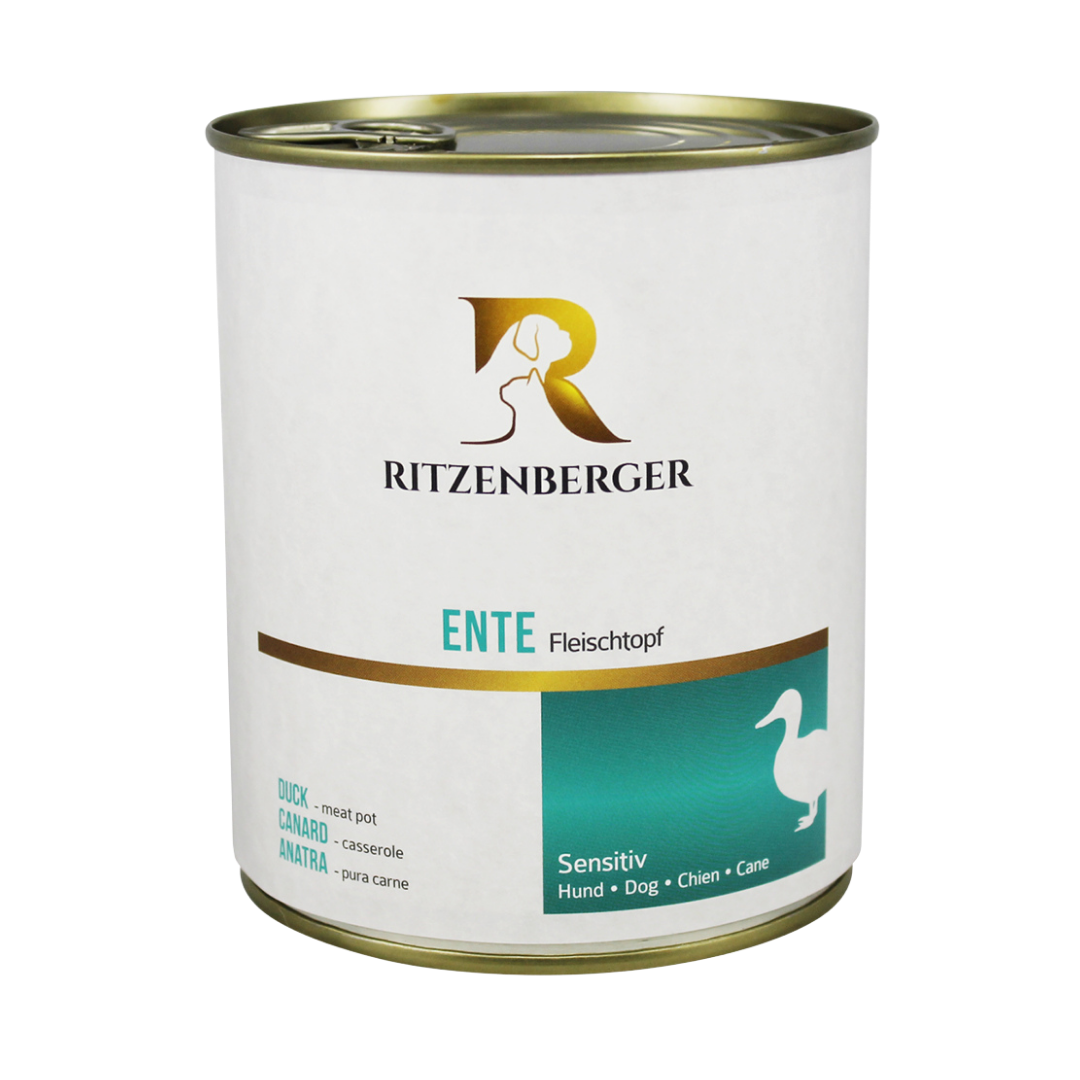 Weiße Dose mit goldfarbenem Deckel, Aufschrift 'Ritzenberger', 'ENTE Fleischtopf', darunter Silhouette einer Ente und Hinweise auf empfindliche Hunde.