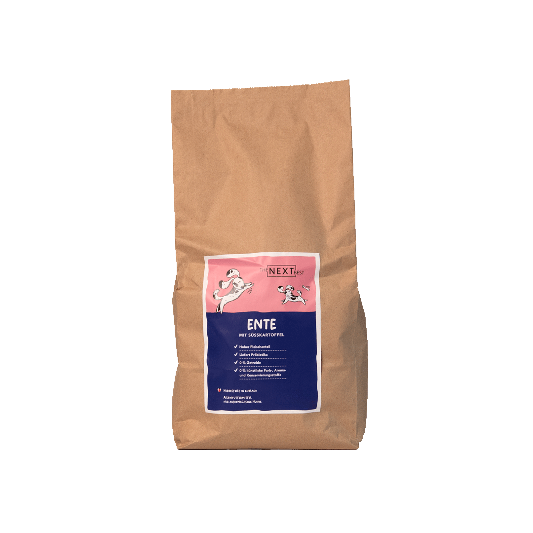 Großer brauner Futtersack von The Next Best mit der Sorte Ente und Süßkartoffel. Hochwertiges Hundefutter mit hohem Fleischanteil, ohne Getreide, künstliche Farb-, Aroma- und Konservierungsstoffe.