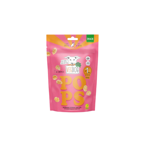 Rosa Verpackung mit der Aufschrift 'VEGDOG POPS' und einer Zeichnung eines Hundekopfs