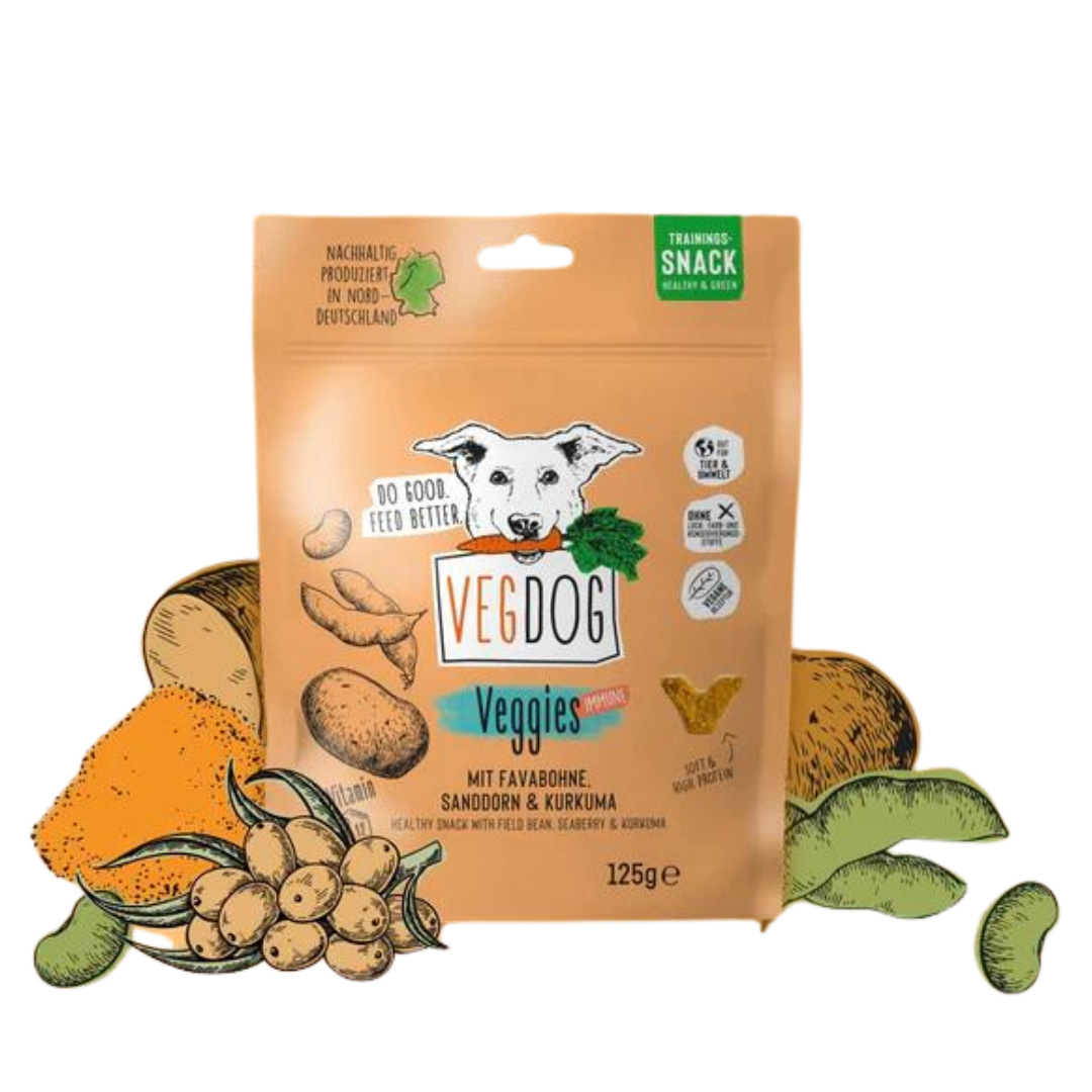 Verpackung von Vegdog Veggies Immune Hundesnack mit Abbildung eines Hundekopfes, Text 'Do good. Feed better', Zutaten wie Fava-Bohne, Sanddorn und Kurkuma, 125 g.