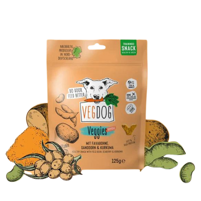 Verpackung von Vegdog Veggies Immune Hundesnack mit Abbildung eines Hundekopfes, Text 'Do good. Feed better', Zutaten wie Fava-Bohne, Sanddorn und Kurkuma, 125 g.