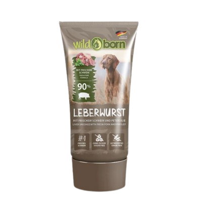 Braune Tube Wildborn Schwein Leberwurst mit Bild eines Hundes, Text zu 90% frischem Schwein, ohne Zucker und getreidefrei.