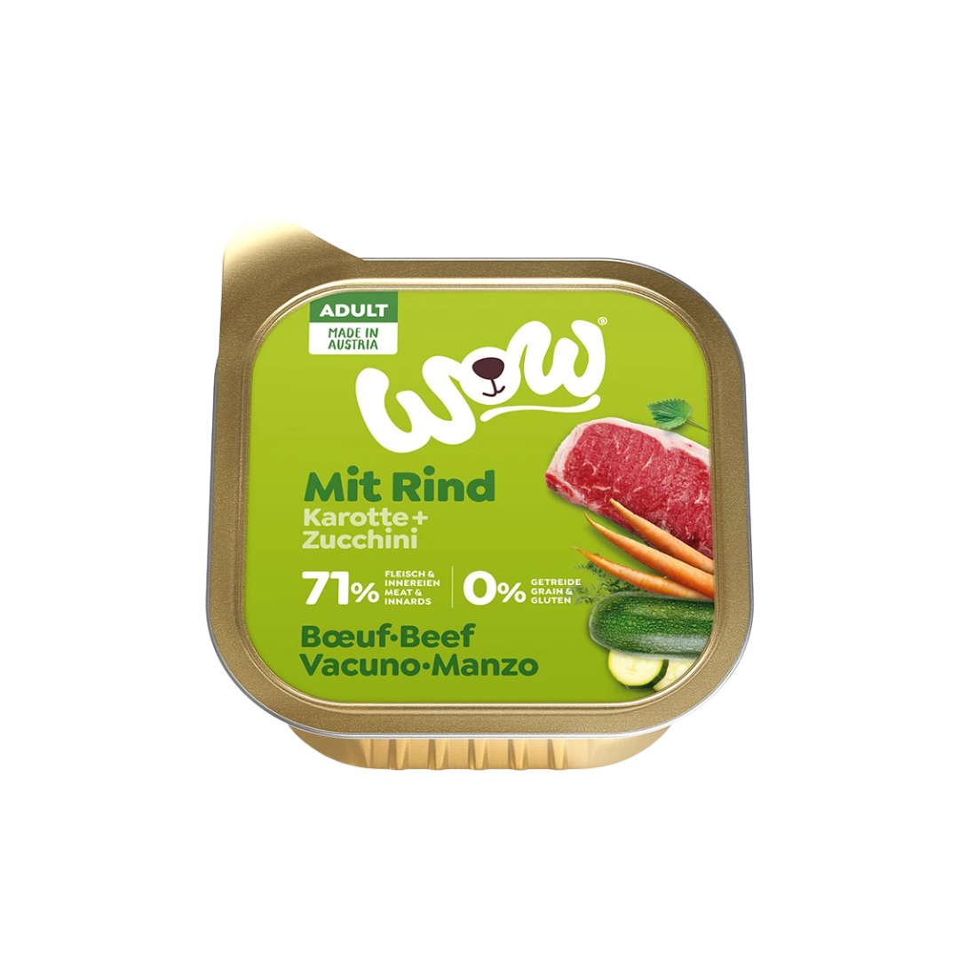 Goldfarbene Verpackung mit Aufschrift 'WOW Dog Rind Adult', Bild von Rinderfilets und Kräutern, 71 % Fleisch und Innereien, ohne Getreide, hergestellt in Österreich.