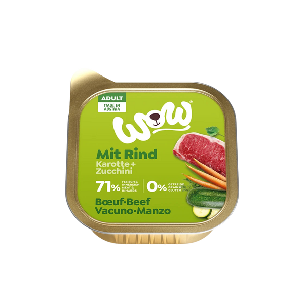 Goldfarbene Verpackung mit Aufschrift 'WOW Dog Rind Adult', Bild von Rinderfilets und Kräutern, 71 % Fleisch und Innereien, ohne Getreide, hergestellt in Österreich.